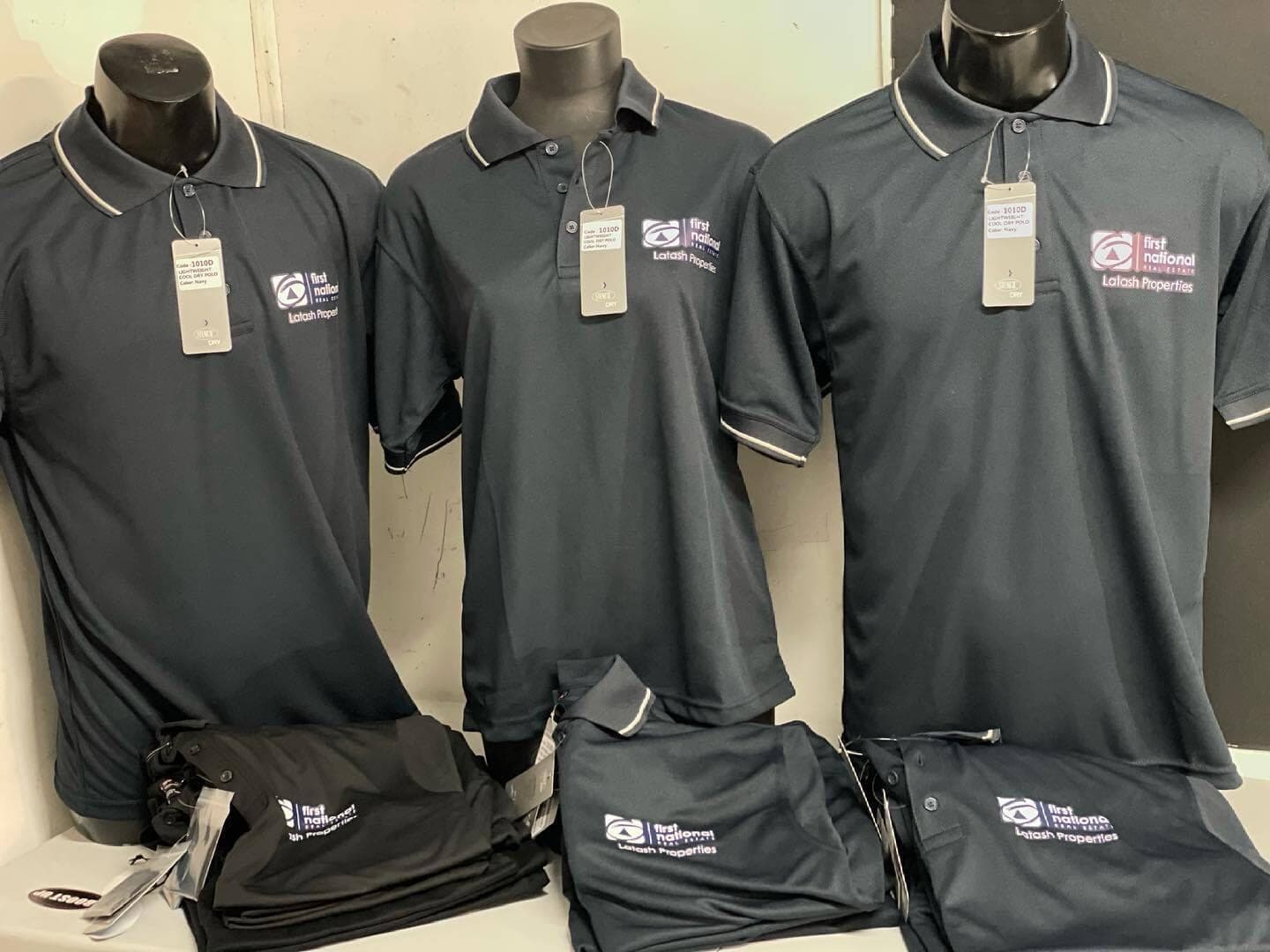Navy First National Greenacre polos with a left-chest logo