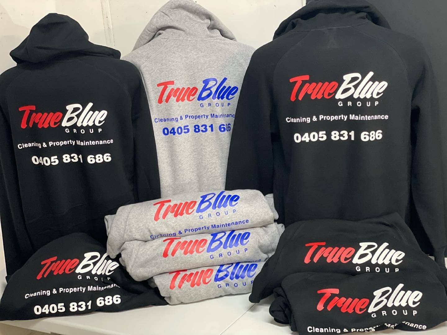 True Blue Carpet Cleaning hoodies with the business logo on the chest